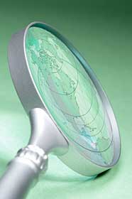 Magnifying glass on globe